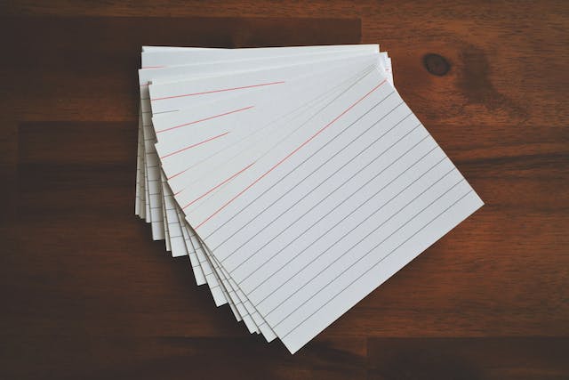 Pile of blank white index cards.
