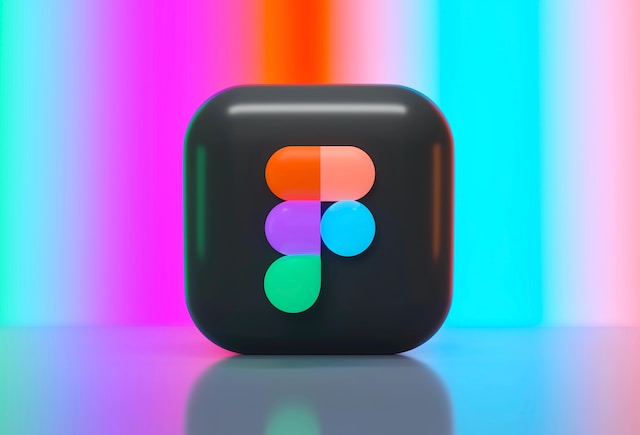 A graphic showing the Figma app logo in front of a colorful background.