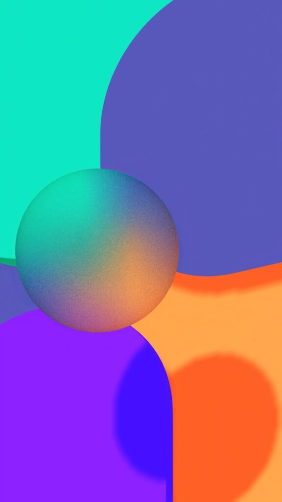 A close-up of a multicolored background with a semi-transparent sphere in the middle. 
