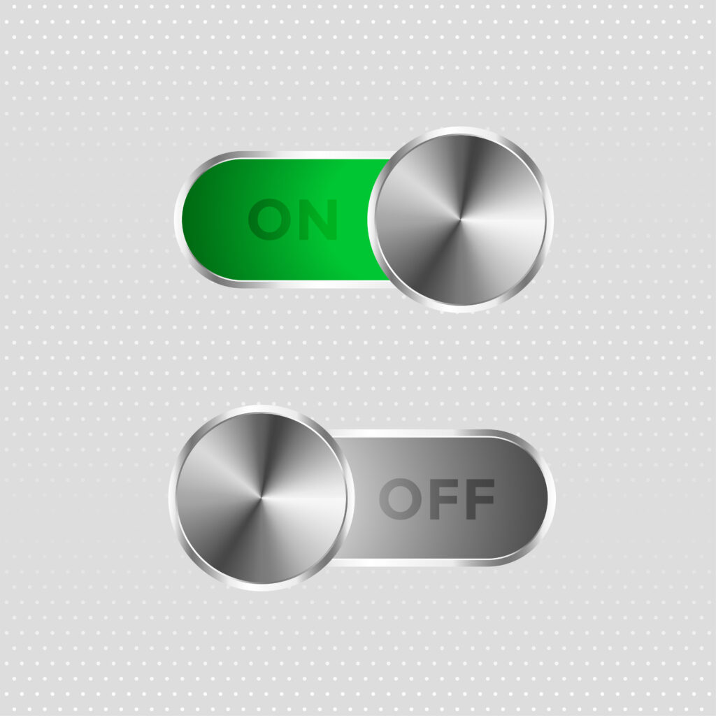 Two differently colored toggles that represent an ‘on’ switch and an ‘off’ switch. 
