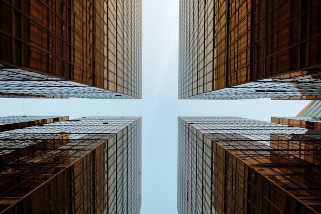 An image of four perfectly aligned buildings to represent symmetry.