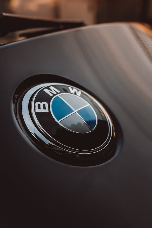 A close-up of the blue, black, and silver BMW logo.