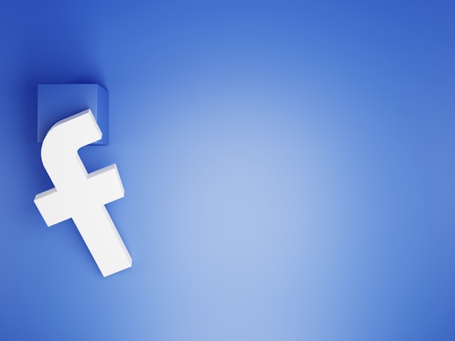 Blue Facebook logo on a blue background.
