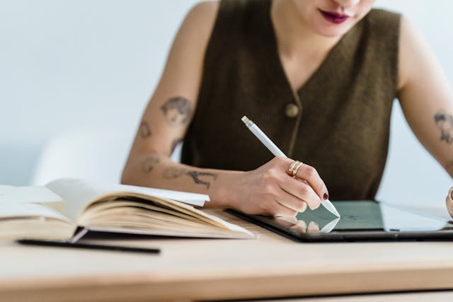 An artist using a drawing tablet.