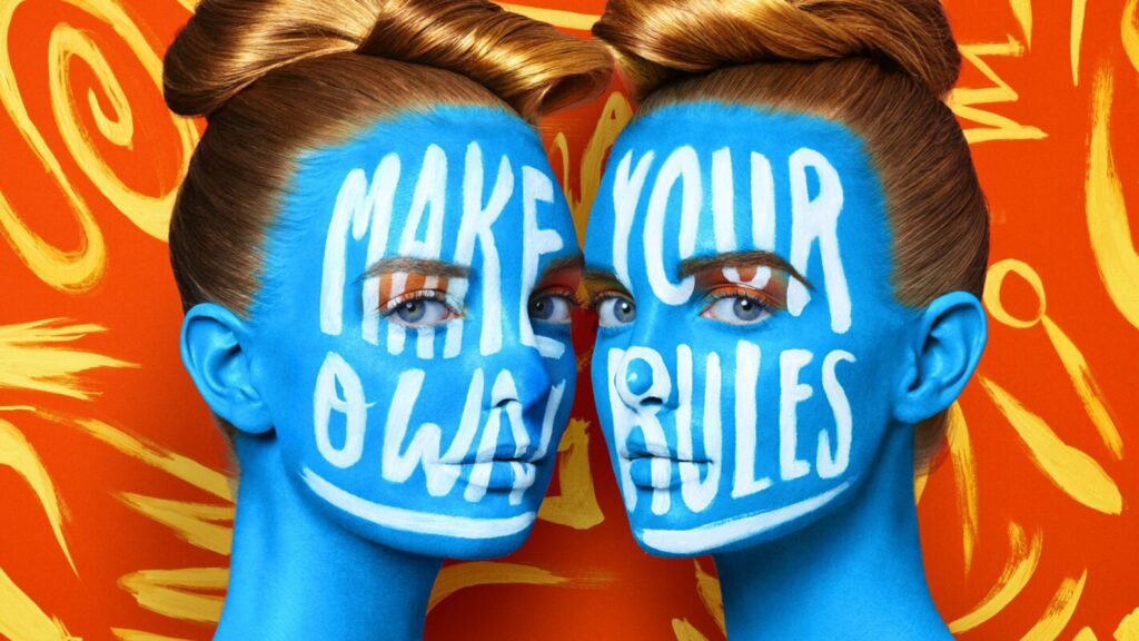 A Page Flows screenshot from Creative Boom showing Jessica Walsh’s work of two women wearing bright blue makeup. 
