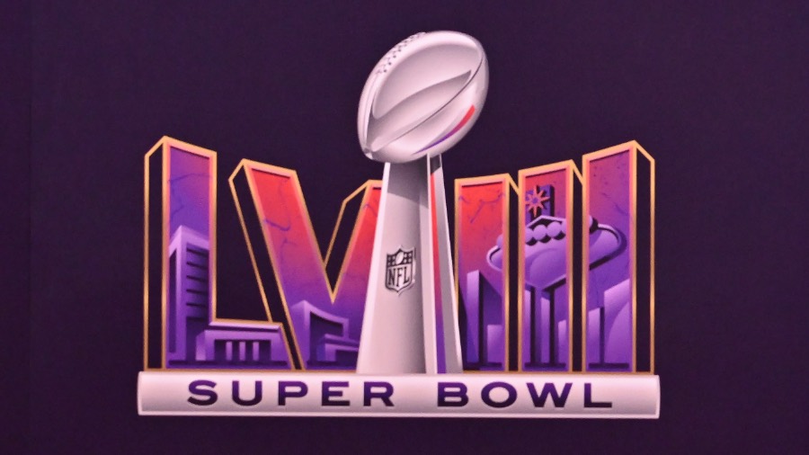 A Page Flows screenshot from KSLSports for the Super Bowl LVIII logo, displaying a smooth transition from red to dark purple.