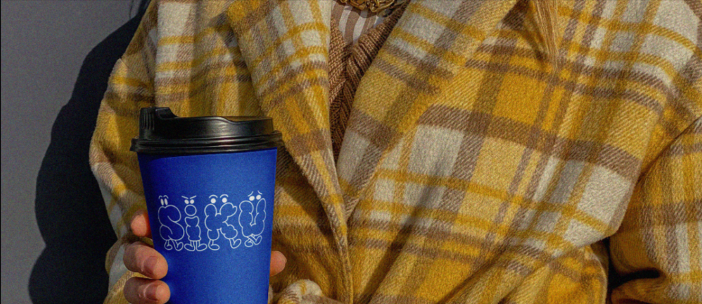 A Page Flows screenshot of Dzaki Dhillon's portfolio from Behance showing someone holding a coffee cup.